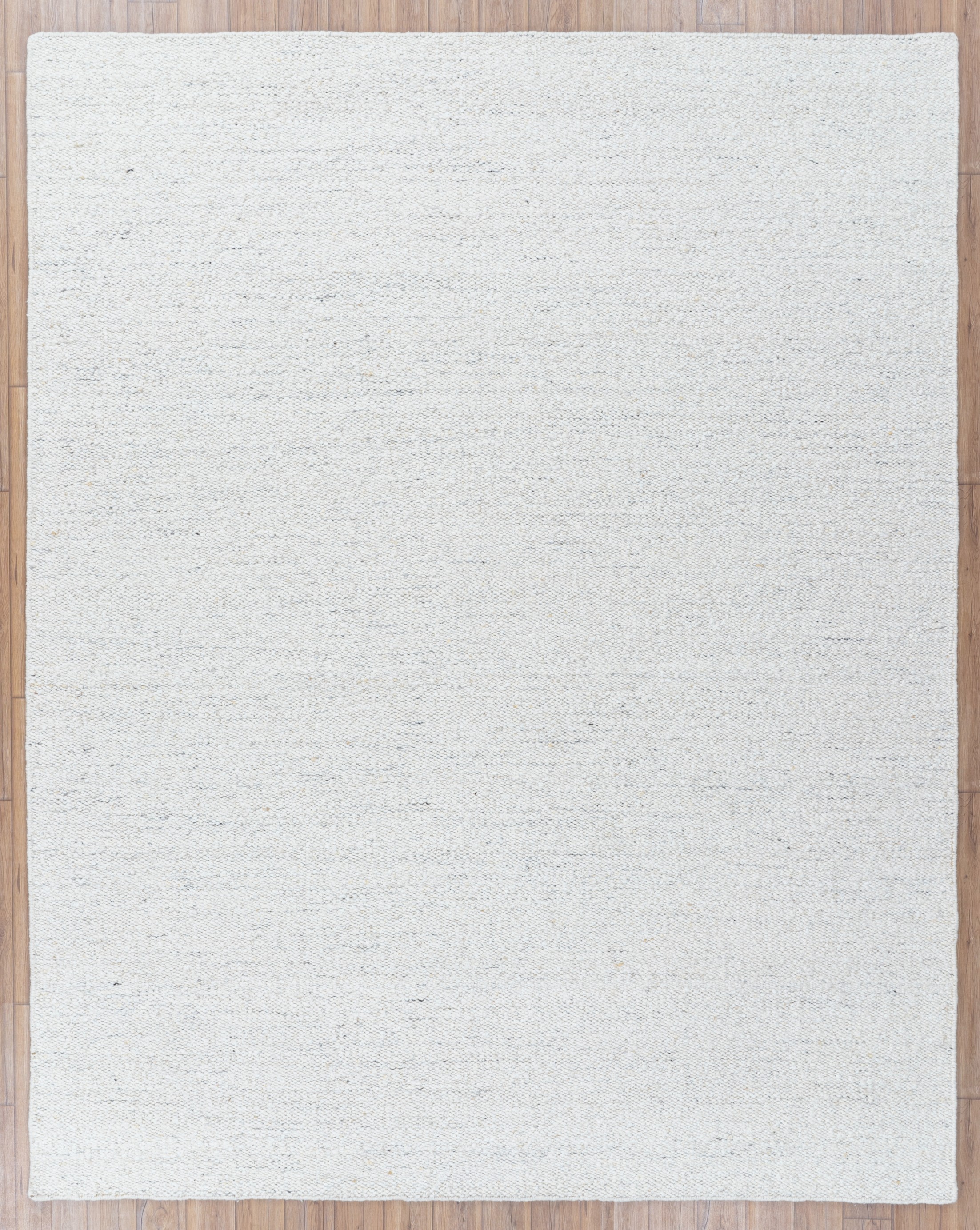 Handwoven Ivory Textured Wool Carpet